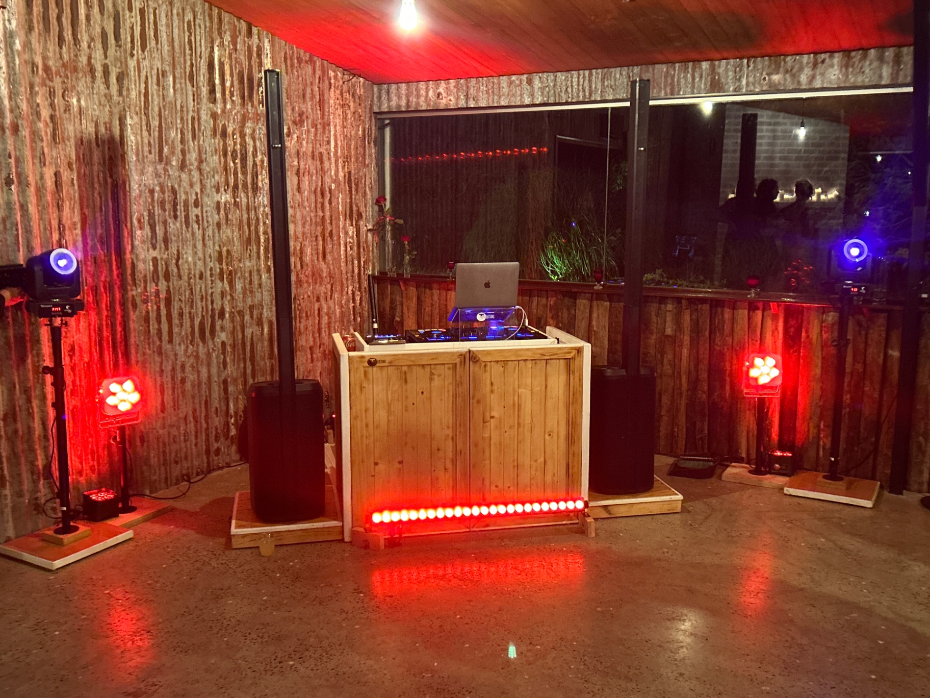 Intimate red-lit reception — TJ Productions setup